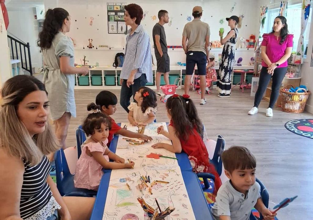 Children and teachers during a Montessori classroom activity at Rose Child Care Center in Lonsdale, North Vancouver